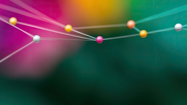 An abstract image featuring spheres connected by lines against a blurred, colorful background.