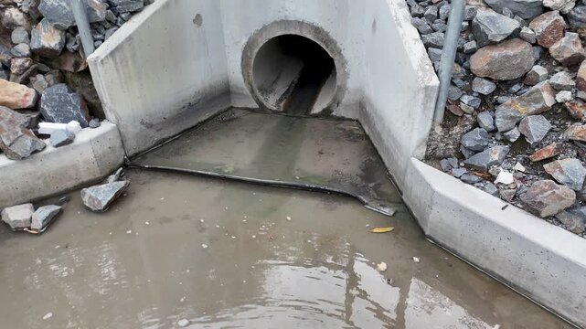 Stormwater Flow from Concrete Drainage Culvert in Gold Coast