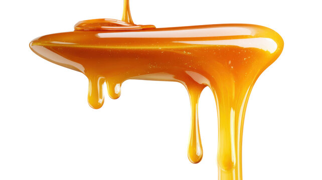 Golden caramel sauce pouring and dripping, creating sticky streams. Sweet liquid syrup for desserts, isolated on transparency