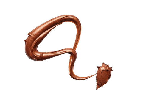 Swirl of bronze cosmetic cream or makeup product smear texture isolated on transparent background