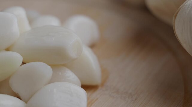 Slicing garlic and onion for a delicious meal preparation