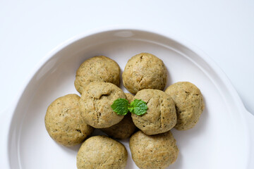 Close-up of homemade mint cookies on a white plate