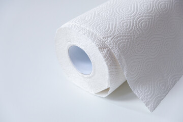 Roll of kitchen paper towel isolated on a white background