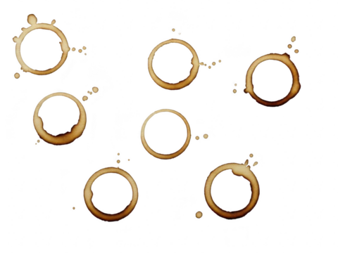 Set of seven brown coffee cup rings stains and splashes isolated on transparent background for design element