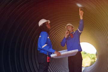 Male and female engineers are checking the integrity and safety of the pipeline