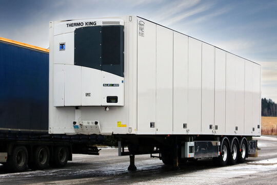 Detached refrigerated semi-trailer manufactured by Ekeri Oy with Thermo King SLXE 400 refrigeration unit at truck stop.