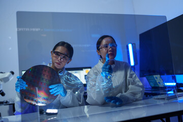 Technician working on analyzing semiconductor or microchip boards, electronics industry, electronic engineer, computer technology, CPU maintenance, hardware, motherboard component upgrades.	