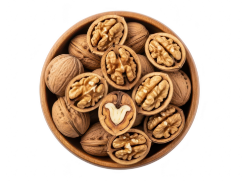 Top view of whole and shelled walnuts in a small wooden bowl isolated on transparent background - Powered by Adobe