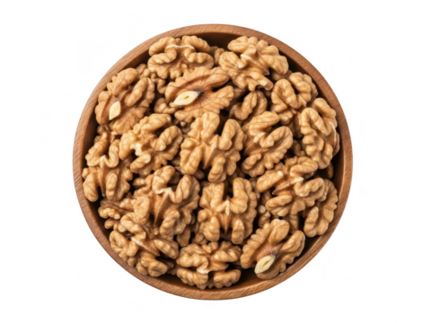 Top view of a wooden bowl filled with shelled walnut halves, isolated on transparent background