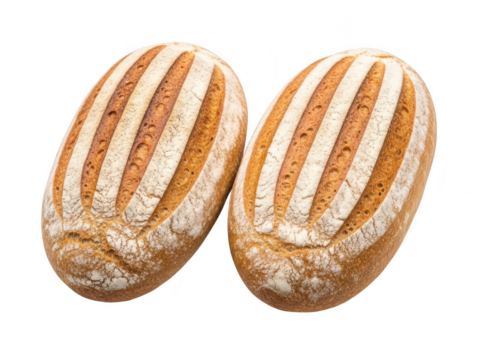 Two rustic oval loaves of rye bread with white flour dusting and diagonal scoring, isolated on transparent background