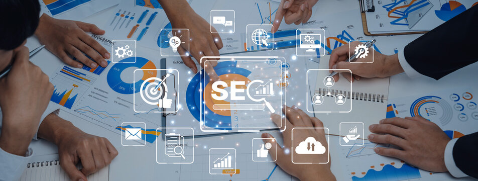A collaborative business meeting showcasing hands working on charts and graphs, highlighting data analysis and strategic planning in a modern workspace. Trope - Powered by Adobe
