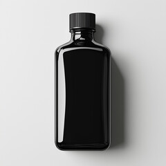 Black glass bottle with cap on white background