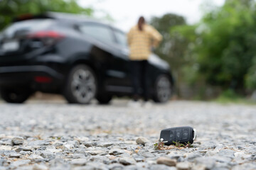 Lost car keys on the ground, Car keys dropped on the floor or fall lying on the street home front. Walking Away From Lost Car Key, can not transport, express, rush time, wast time, emergency