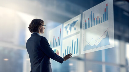 Automated Marketing Tools Business professional analyzing futuristic digital data charts on transparent virtual screens.