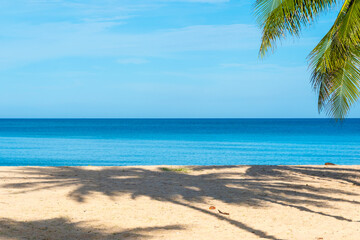 Nature of the ocean and blue sky Summer with sunshine, sandy beaches, clear blue waters sparkling against the blue sky. on an island with good ecology and environment Background for summer vacation