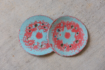 Dirty sanding disks with blue paint