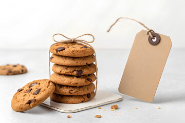 Stack of chocolate chip cookies with gift tag
