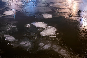 Drifting ice floes on river. ice drift on Moscow river © diy13