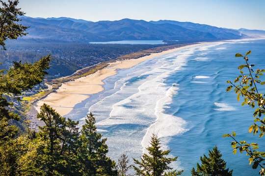 Scenic aerial view of Tillamook Bay beach on sunny day in Oregon