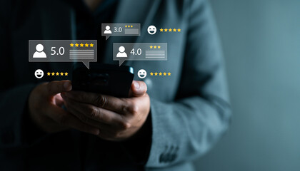 Close-up of businessman using smartphone with customer review and star rating icons, user feedback, product evaluation, online reputation, client satisfaction and digital rating systems.