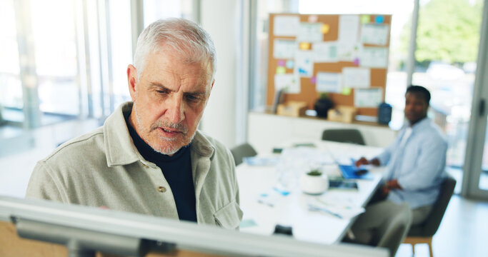 Mature, businessman and presentation meeting with board for project planning or brainstorming. Man, CEO or creative executive with ideas or staff for coaching, company agenda or tasks in workplace - Powered by Adobe