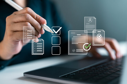 Business person using digital pen and laptop with checklist and document icons, task management, digital approval, document workflow, productivity tools and paperless organization systems.