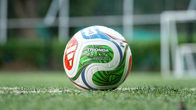 Bangkok, Thailand - 17 October 2025: Adidas launch "Trionda" the official match ball for Fifa World Cup 2026 that co-host with USA, Canada and Mexico. It on the football training pitch. 