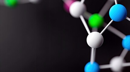 Close-up of a molecular structure with colorful spheres connected by lines against a dark background.