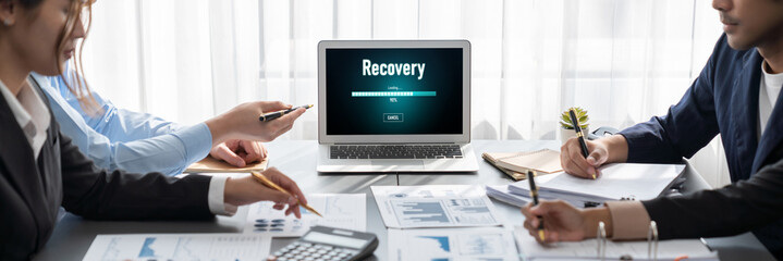 Business intelligence and data analysis concept. Analyst team working on financial data analysis...