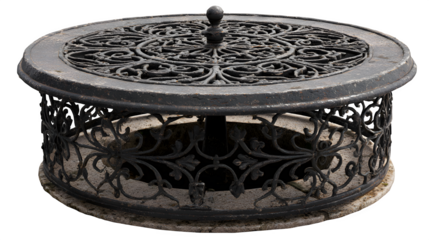A small, decorative well cover made of wrought iron, protecting a water source in a village square, isolated on a Transparent background