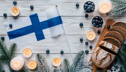 Festive Finnish Holiday Still Life with Finland Flag, Candles, and Winter Berries. Independence day of Finland