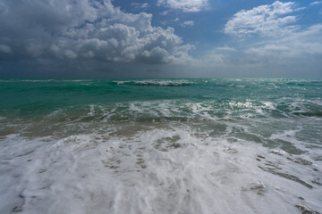 Sea waves. Summer background. Ocean water motion. Ocean splash wave background. Deep blue sea beach. Turquoise wave background. Dreamy exotic sea beach background. Summer banner.