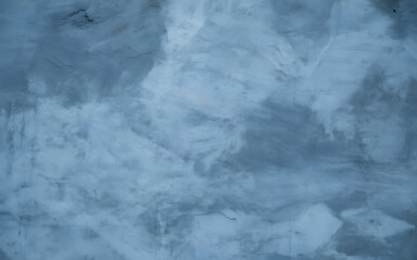 Abstract blue textured background with subtle variations and soft cloudy appearance