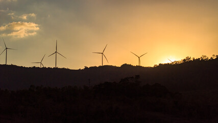 Panoramic view of wind farm or wind park, with high wind turbines for generation electricity with copy space. Green energy concept, Quang Tri, Vietnam