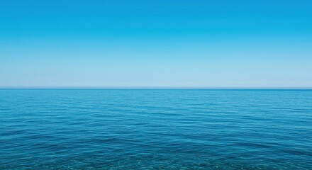 Vast expanse of crystal clear ocean water in mesmerizing shades of deep blue, reflecting the sky and inviting tranquil escape ,peaceful ,turquoise ,serene