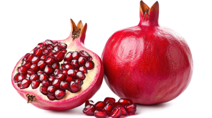 A red pomegranate is cut in half revealing its seeds