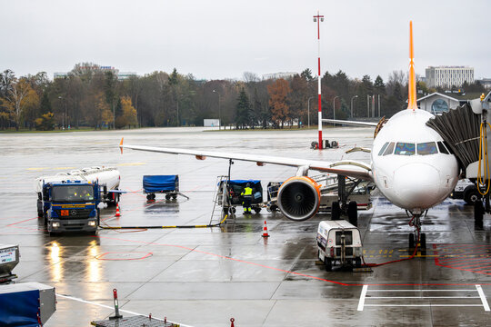 Warsaw, Poland - November 09,2025: Close-up of Airbus A320/A321 Aircraft Being Refueled by a Fuel Tanker Truck on the Tarmac at Warsaw Chopin Airport (WAW)
