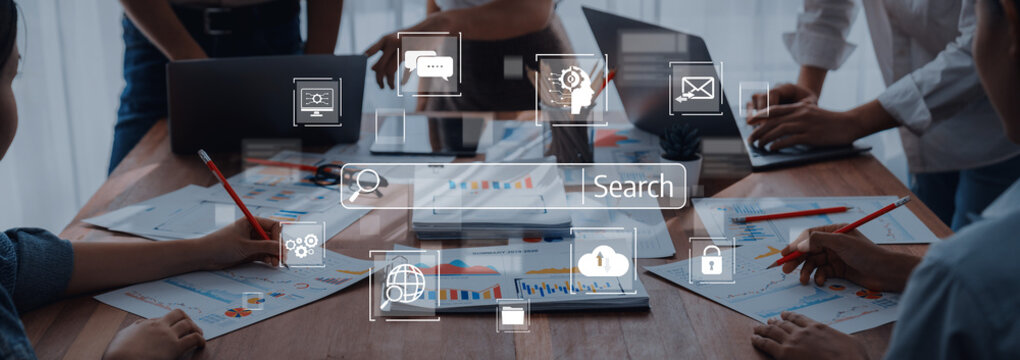 A diverse team collaborates on business strategies using technology in a modern workspace. Digital tools and graphs illustrate effective planning and engagement. Trope