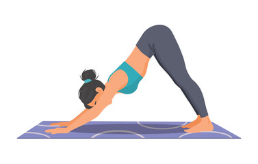Woman practicing yoga doing downward dog pose on the mat
