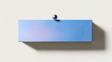 A shiny sphere balances on top of a blue rectangular prism, casting a shadow on a cream-colored background. The composition is clean and minimalist.