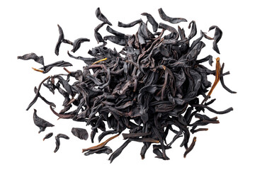 Obraz premium Dark, dried tea leaves in a pile, overhead shot on a black background