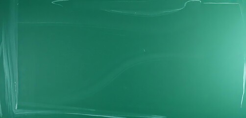 Dark green chalkboard surface with subtle texture and slight chalk dust,  blank,  scratched