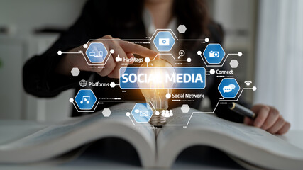 A creative visual representing social media engagement, featuring a light bulb and digital icons. Ideal for concepts related to networking and communication in business. Tessel