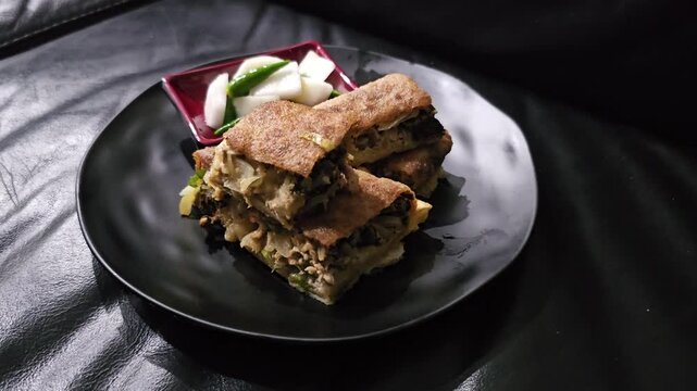ice cream dessert,Martabak telur,Egg martabak,Murtabak,Mutabbaq,suffed pancake,Pan fried bread with egg,meat,spring onion and vegetables filling,served with sambal or cayenne pepper,achar or pickle an