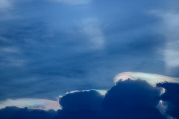 The cloud has rainbow colors.