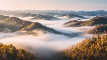 Obraz premium foothills. Misty mountainous landscape at dawn with golden light over panoramic foothills. travel magazines, destination branding, designed for outdoor magazines and nature guides.