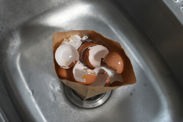 Eggshells in a paper bag