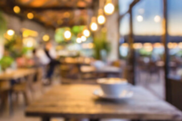 Blurred empty open space Restaurant and coffee shop cafe interior for background.