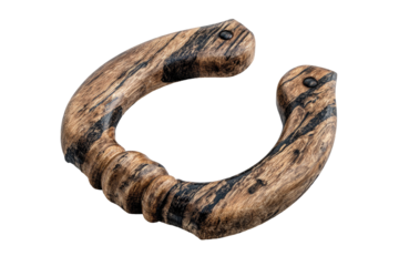 A close-up of a curved object with a wood grain texture, mounted on a black background