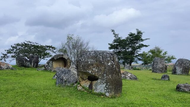 Valley of the Jars, Laos. Phongsavan. Valley of the Jars. The megalithic archaeological landscape consists of thousands of stone jars scattered across the Xiangkhouang Plateau. 4К